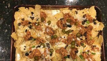 pulled chicken and queso nachos