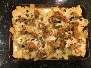 pulled chicken and queso nachos