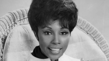 Diahann Carroll Sitting with Hands Clasped