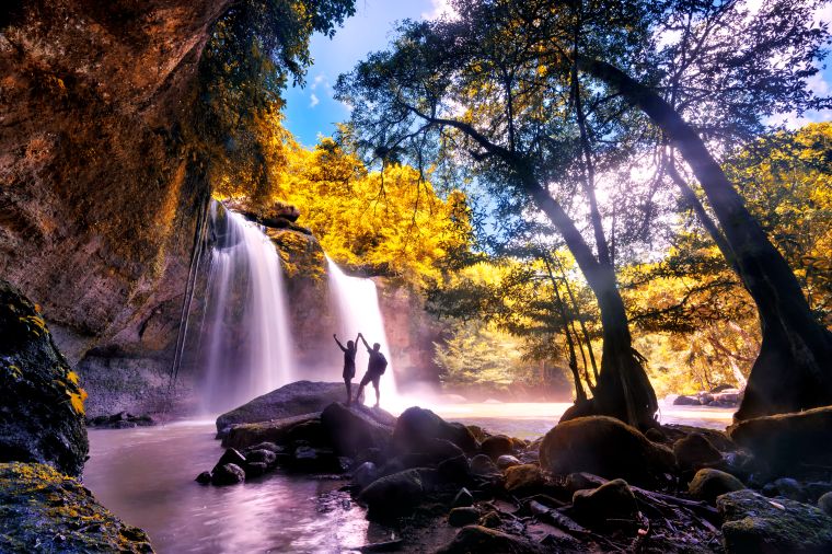 Heo Suwat Waterfall in Khao Yai National Park Famous waterfall park in Thailand . autumn season for leaves.