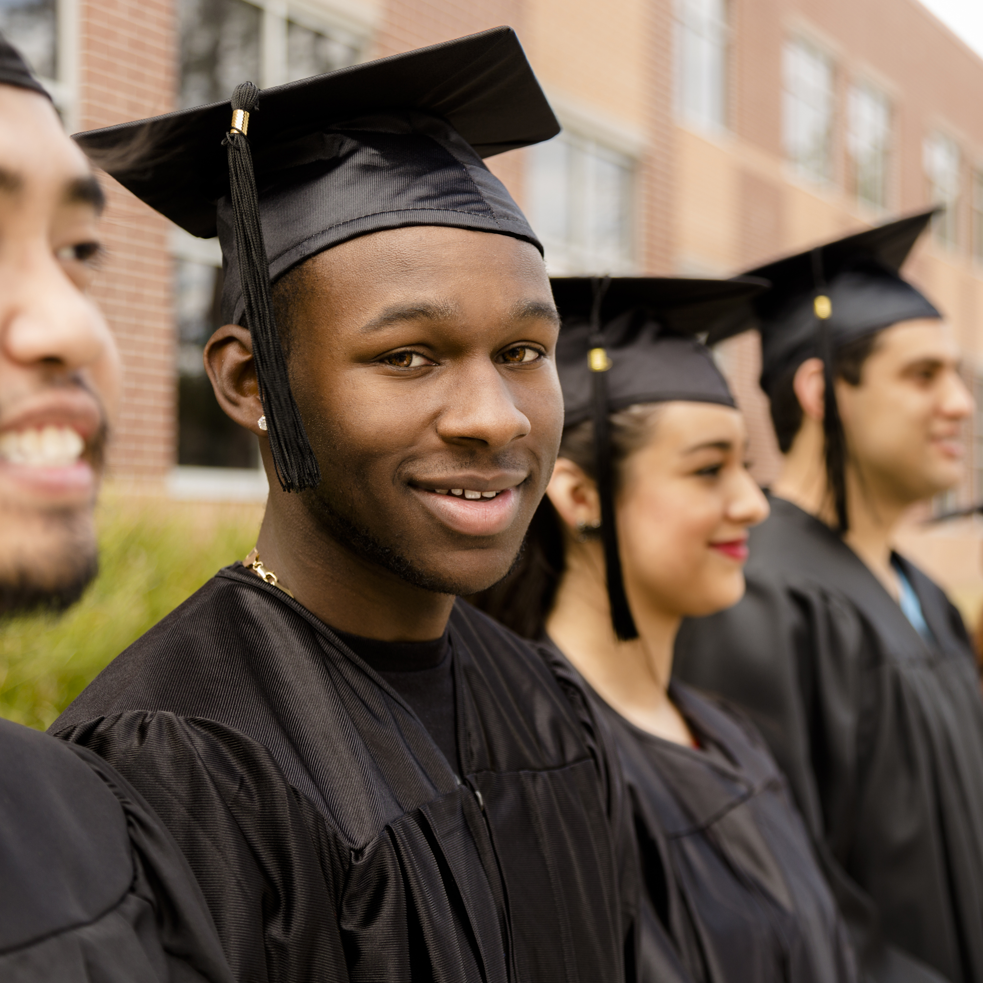 African descent college student at college graduation.