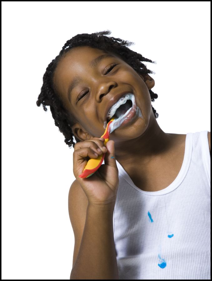 Boy brushing his teeth
