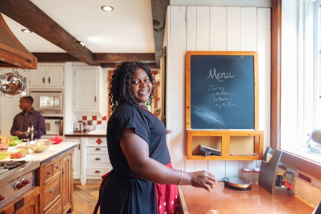 African-American preparing thanksgiving dinner