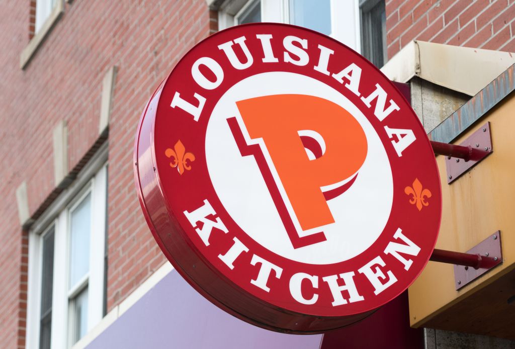 Popeyes Lousiana Kitchen sing or logo outside a restaurant...