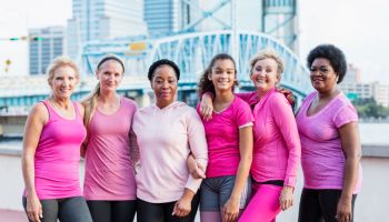 Group of women support finding a cure for breast cancer