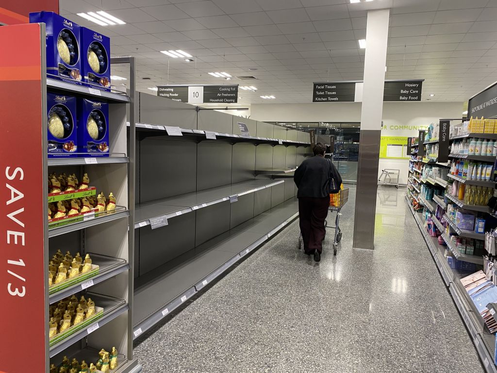 panic buyers continue to strip supermarket shelve