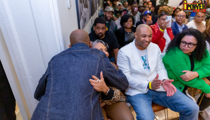 Dame Dash greets Cathy Hughes